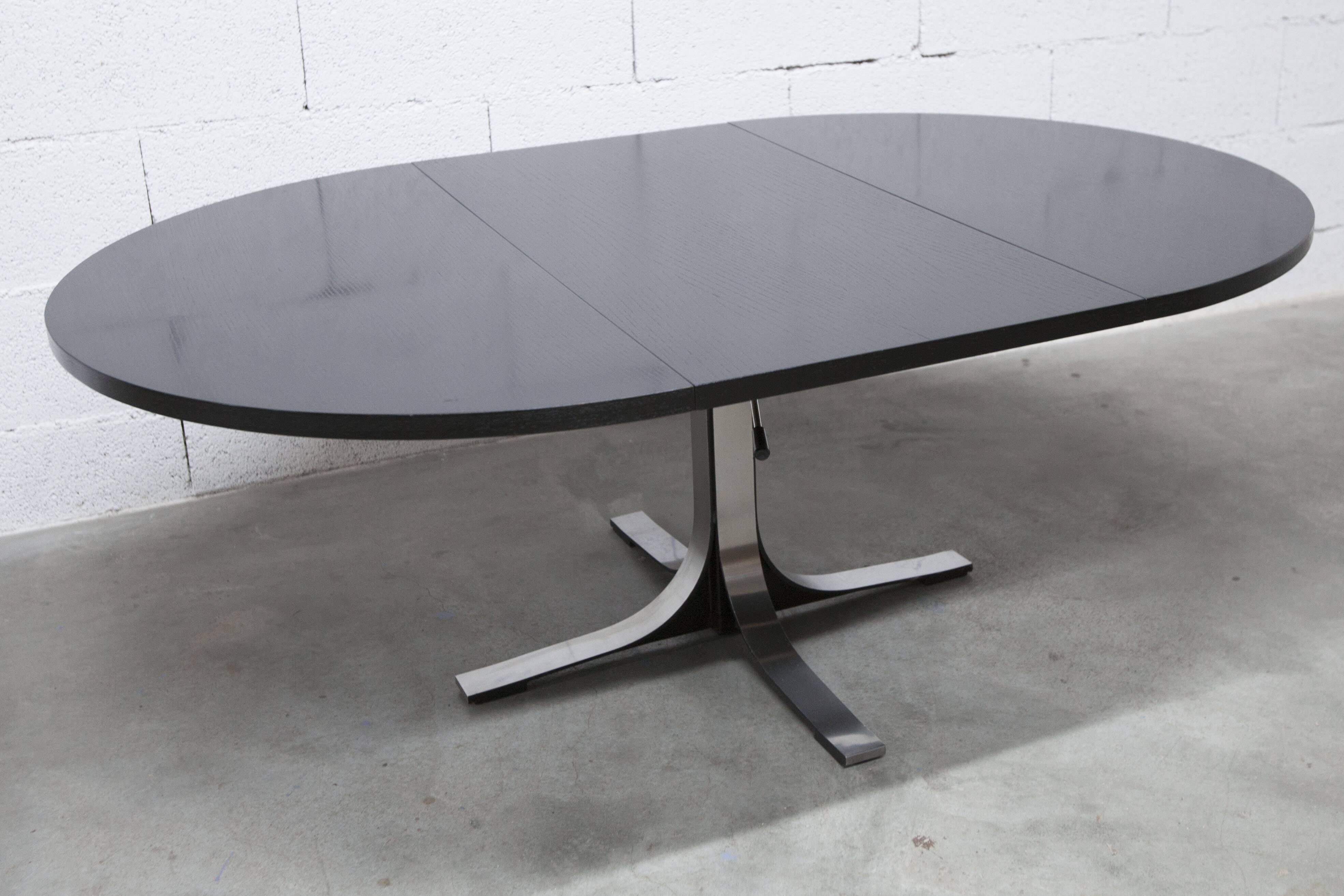 Round table rises and lowers Osvaldo Borsani black and chrome with extension