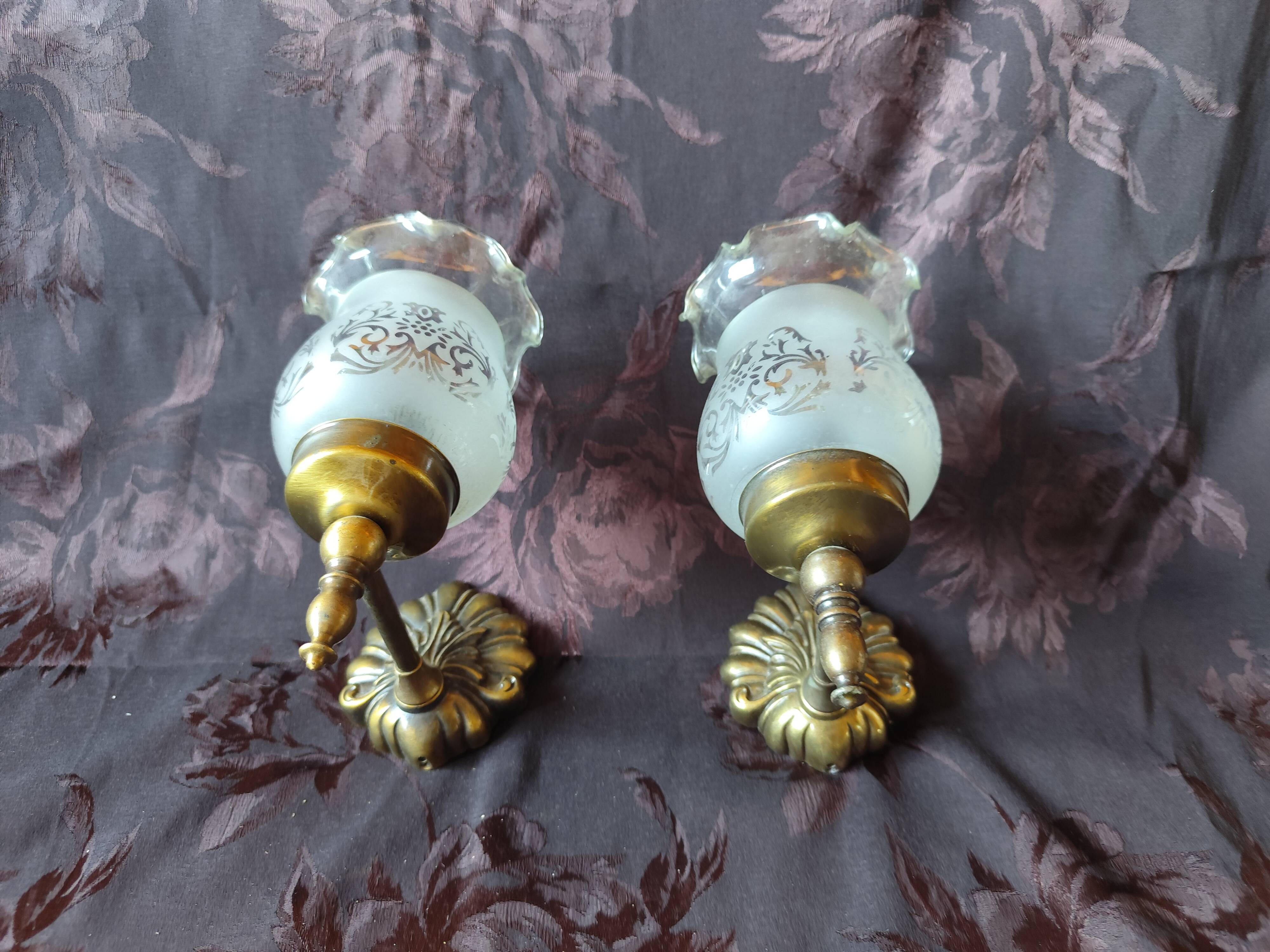 Pair of wall sconces in bronze with opaline glass tulips.
