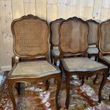 Set of 10 Louis XV style chairs in walnut and cane.