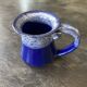 Small enamelled earthenware milk jug
