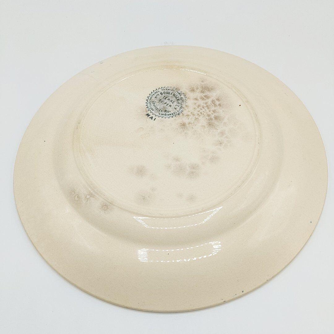 Flat plates in faience Land of Fer Choisy Le Roi, year 50, dark blue décor