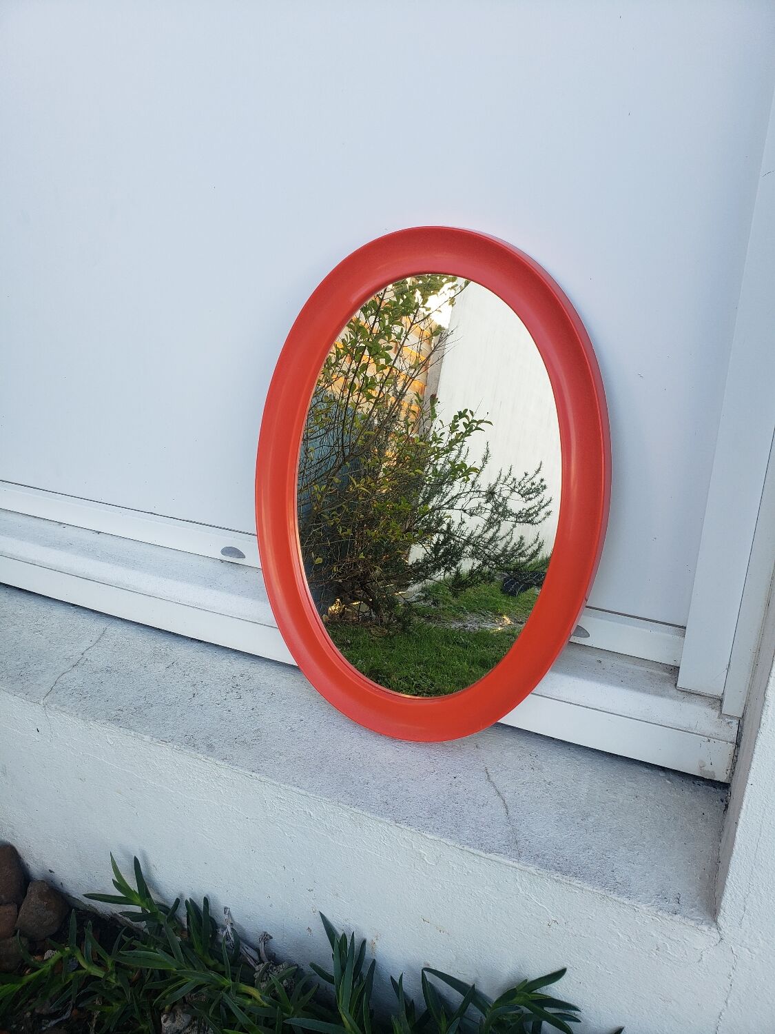 Orange oval mirror 1970 seventie