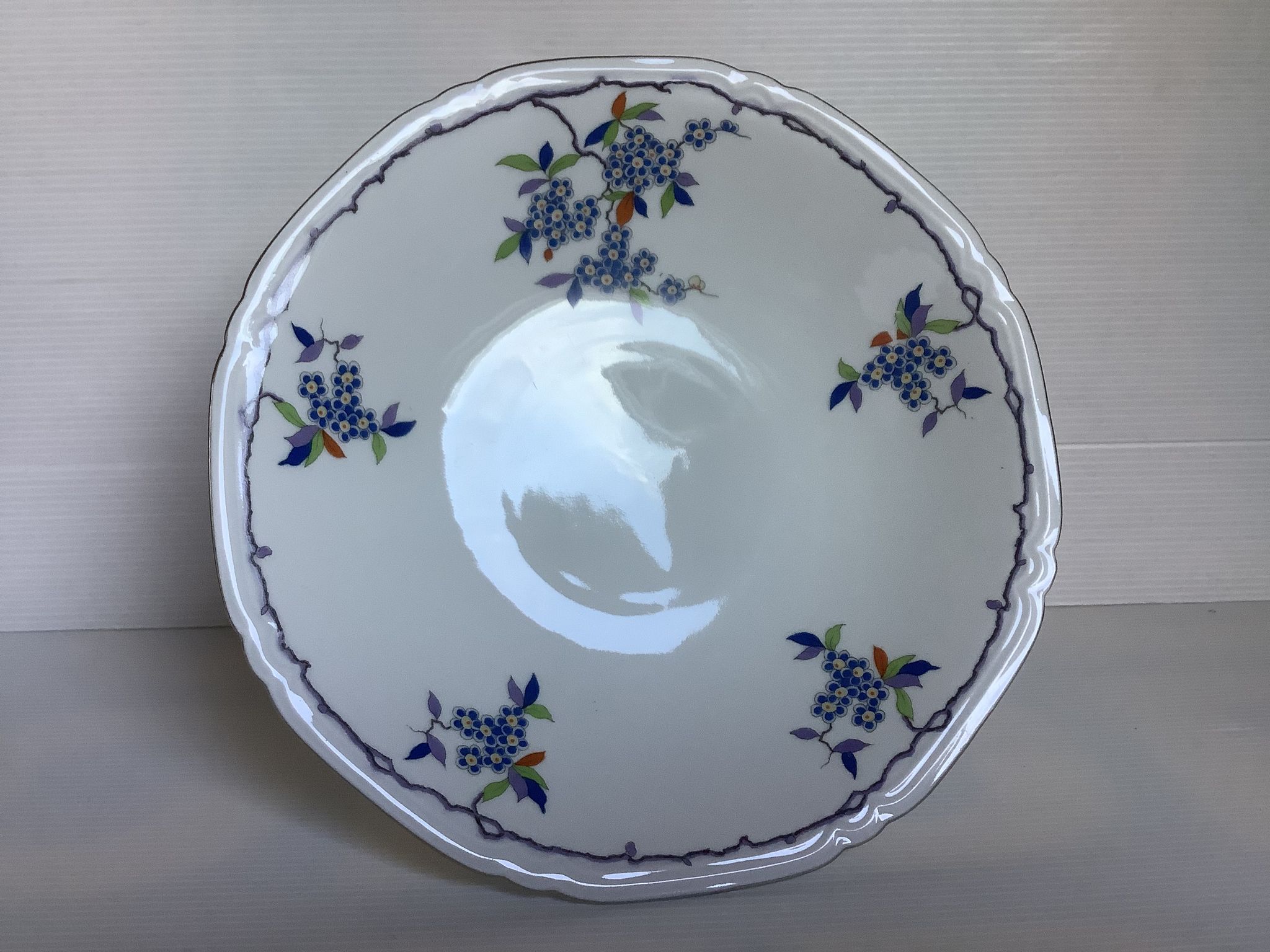 Old shower tray with forget-me-not flowers, Czechoslovakia.