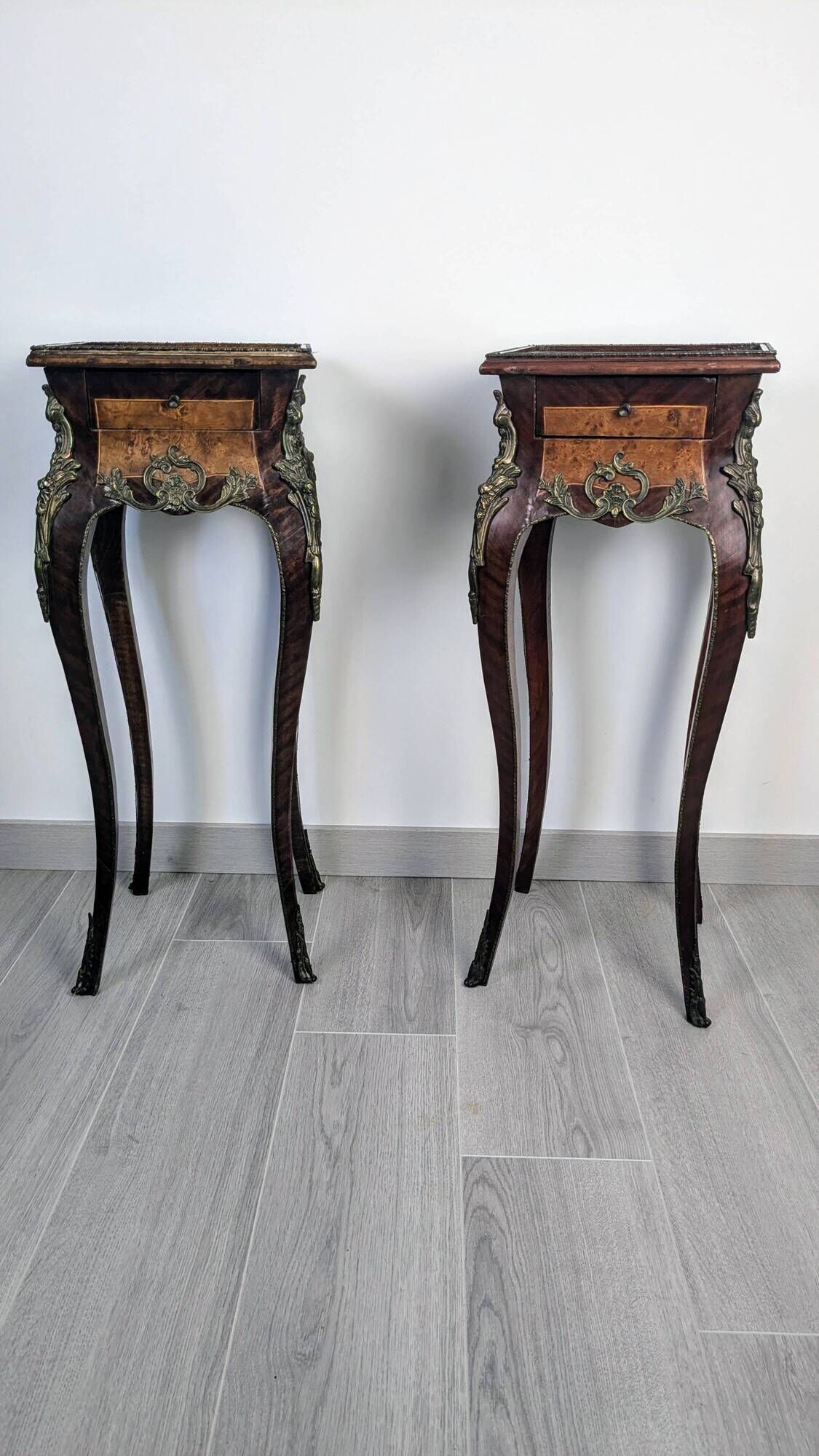 Pair of Louis XV bedside tables with marquetry and gilded bronzes