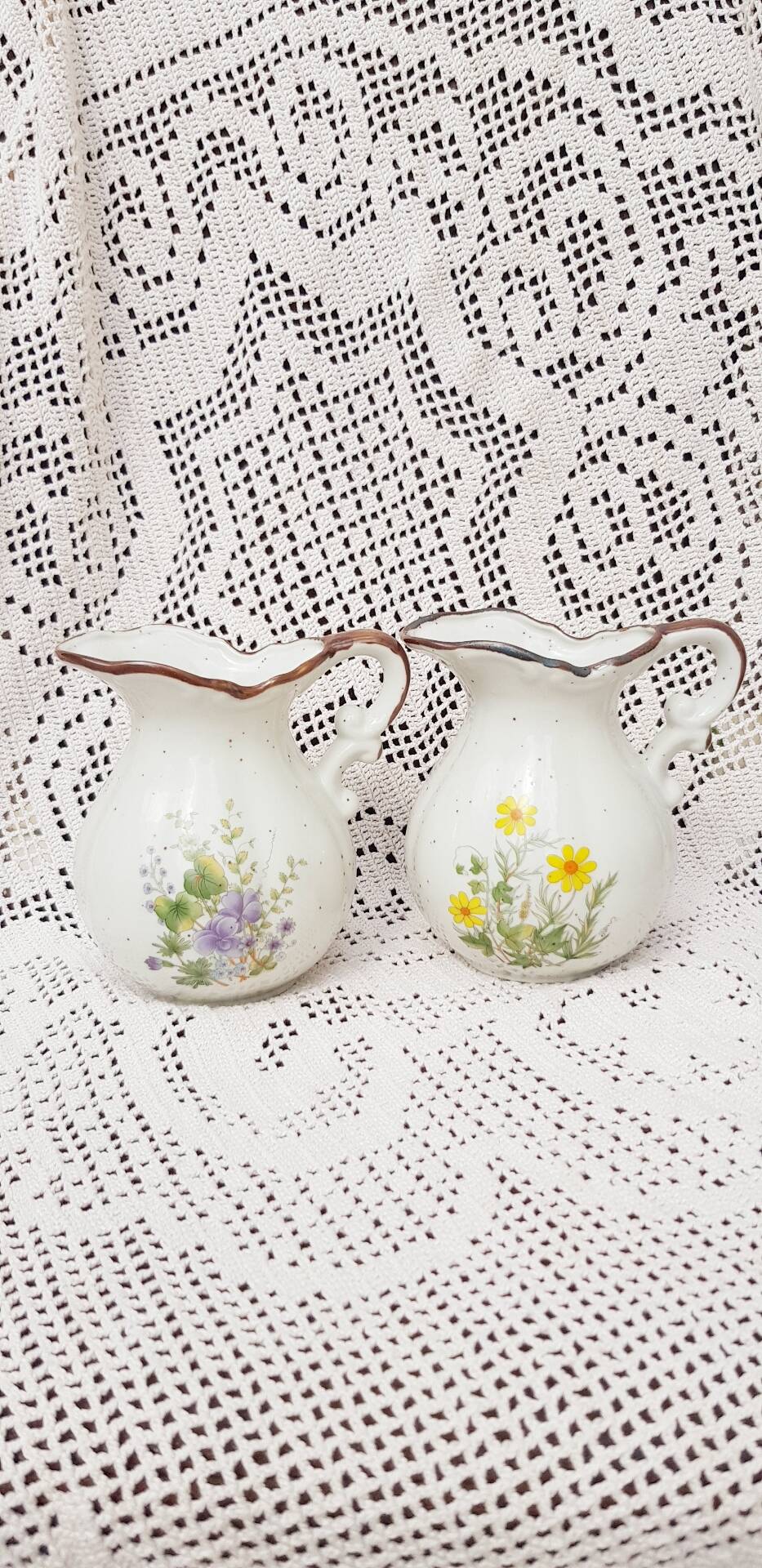Vases, jugs with botanical patterns
