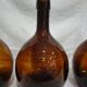 Lot 3 old round bottles