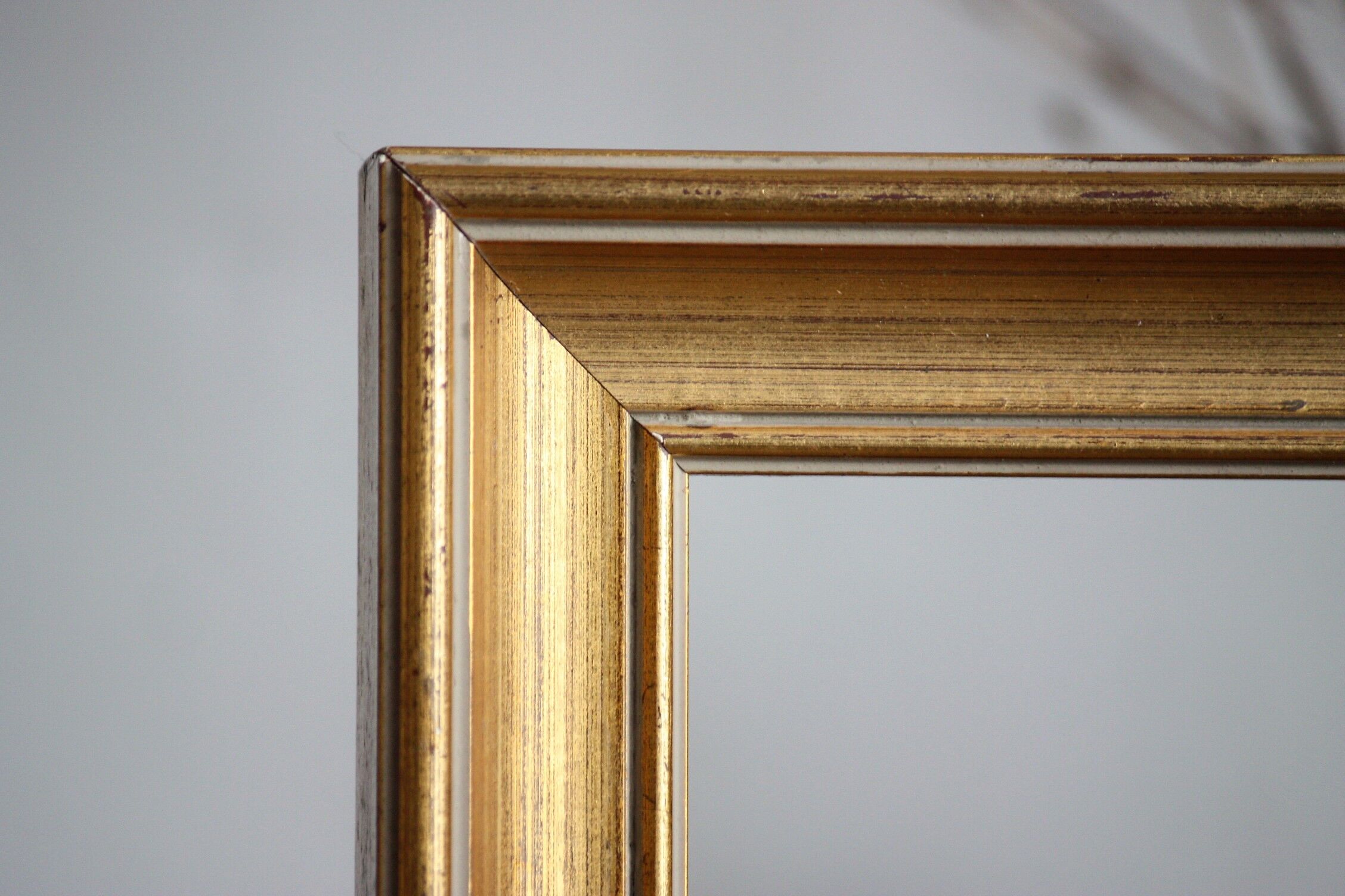 Moulded gilded wood frame