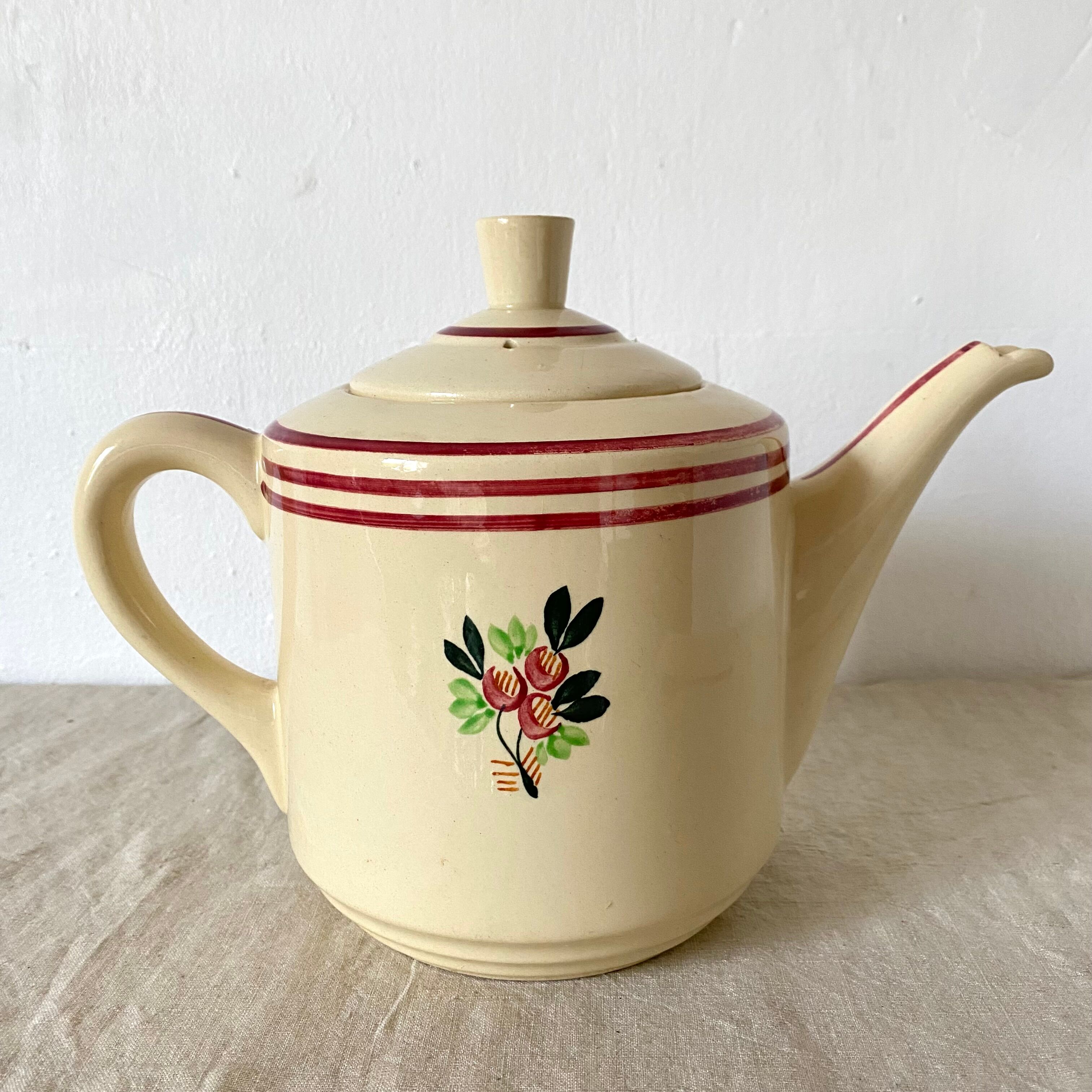 Old teapot in Gien earthenware