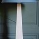 Obelisk lamp with stone effect & deep blue-grey shade, circa 1980.