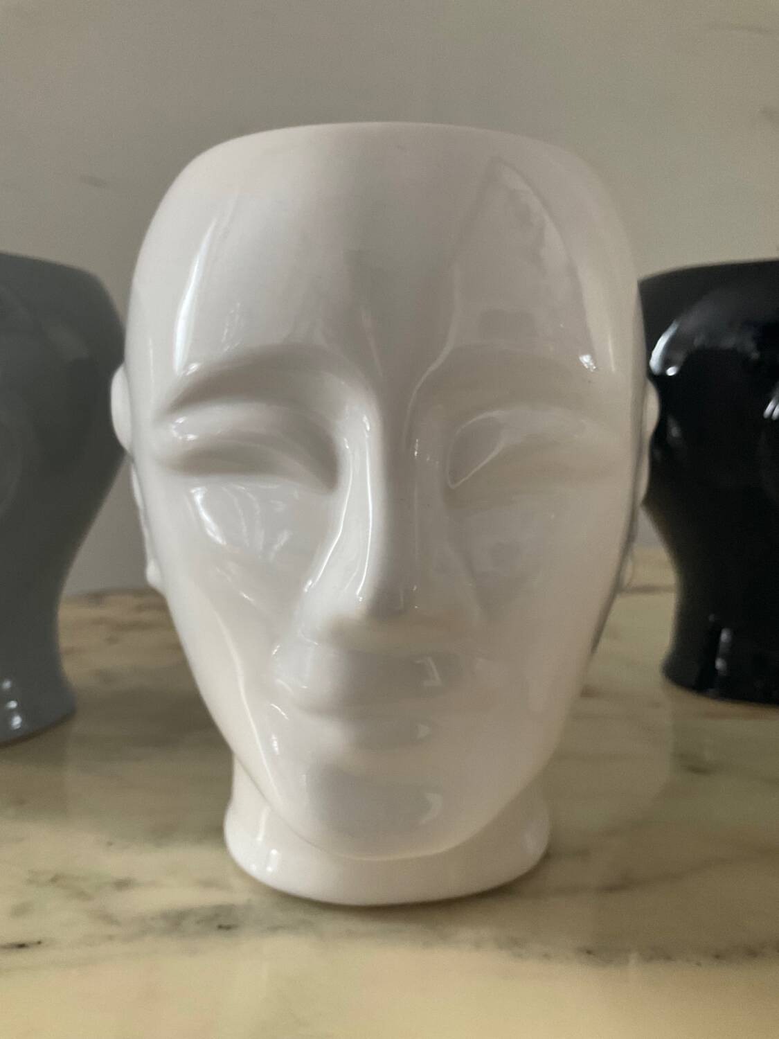 Series of 4 vintage ceramic head vases from the 70s and 80s