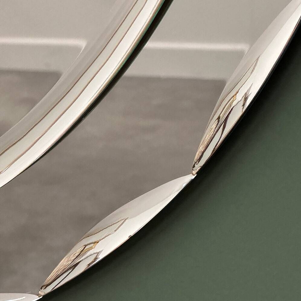 1970s Italian oval mirror by Crystal Arte with faceted glass frame