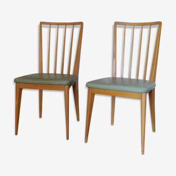 Chaises en bois et skaï vert