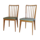 Chaises en bois et skaï vert