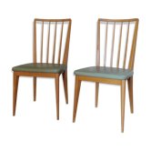 Wooden and green leatherette chairs
