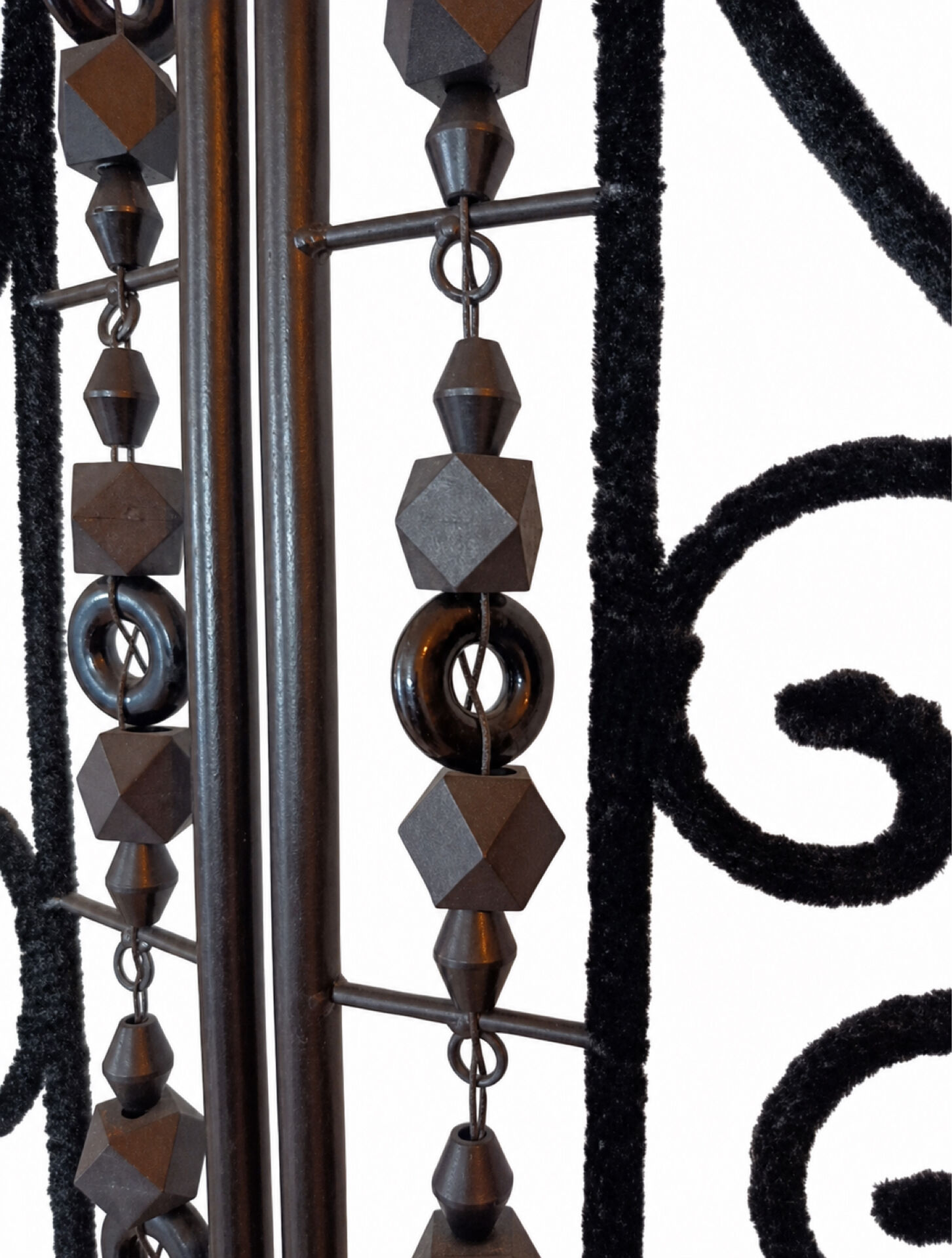 Black wrought iron screen, openwork floral pattern, 3 panels.