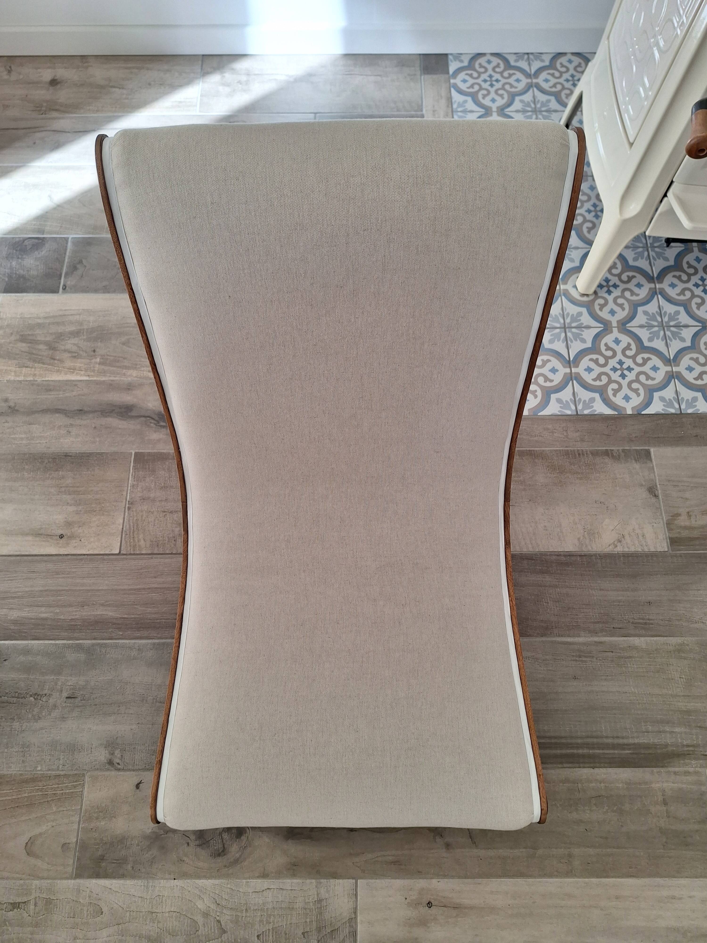 Vintage gondola armchair in beige linen fabric.
