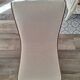 Vintage gondola armchair in beige linen fabric.