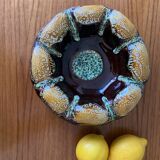 Cup, ashtray, empty ceramic pockets, signed