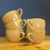 Jug and 5 cups in orange stoneware, very good condition, signed and numbered