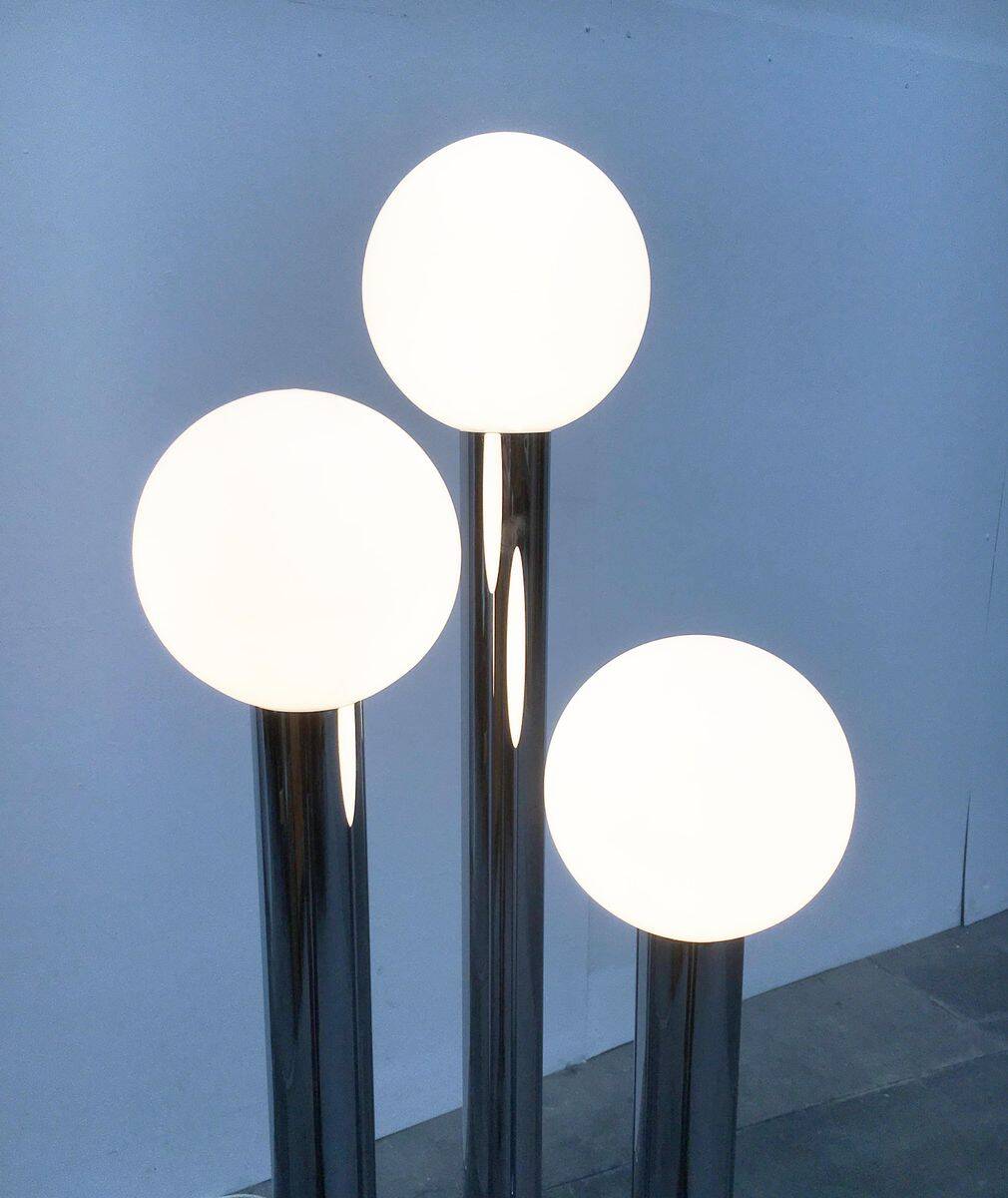 Vintage German floor lamp from the space age of the 1970s in glass and metal.