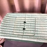 Asparagus dish with drainer in water green tones