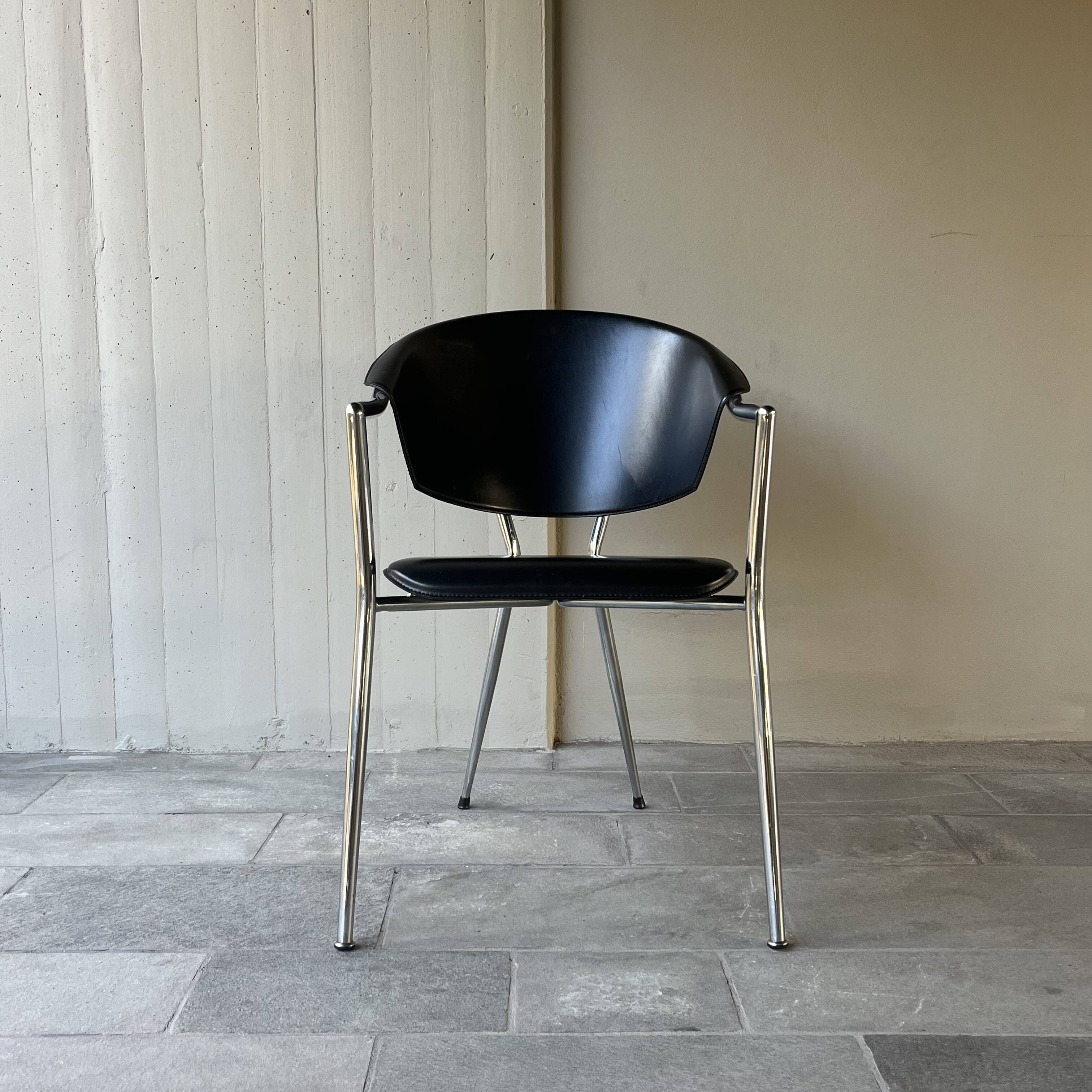 Set of four Italian black leather chairs, 1970