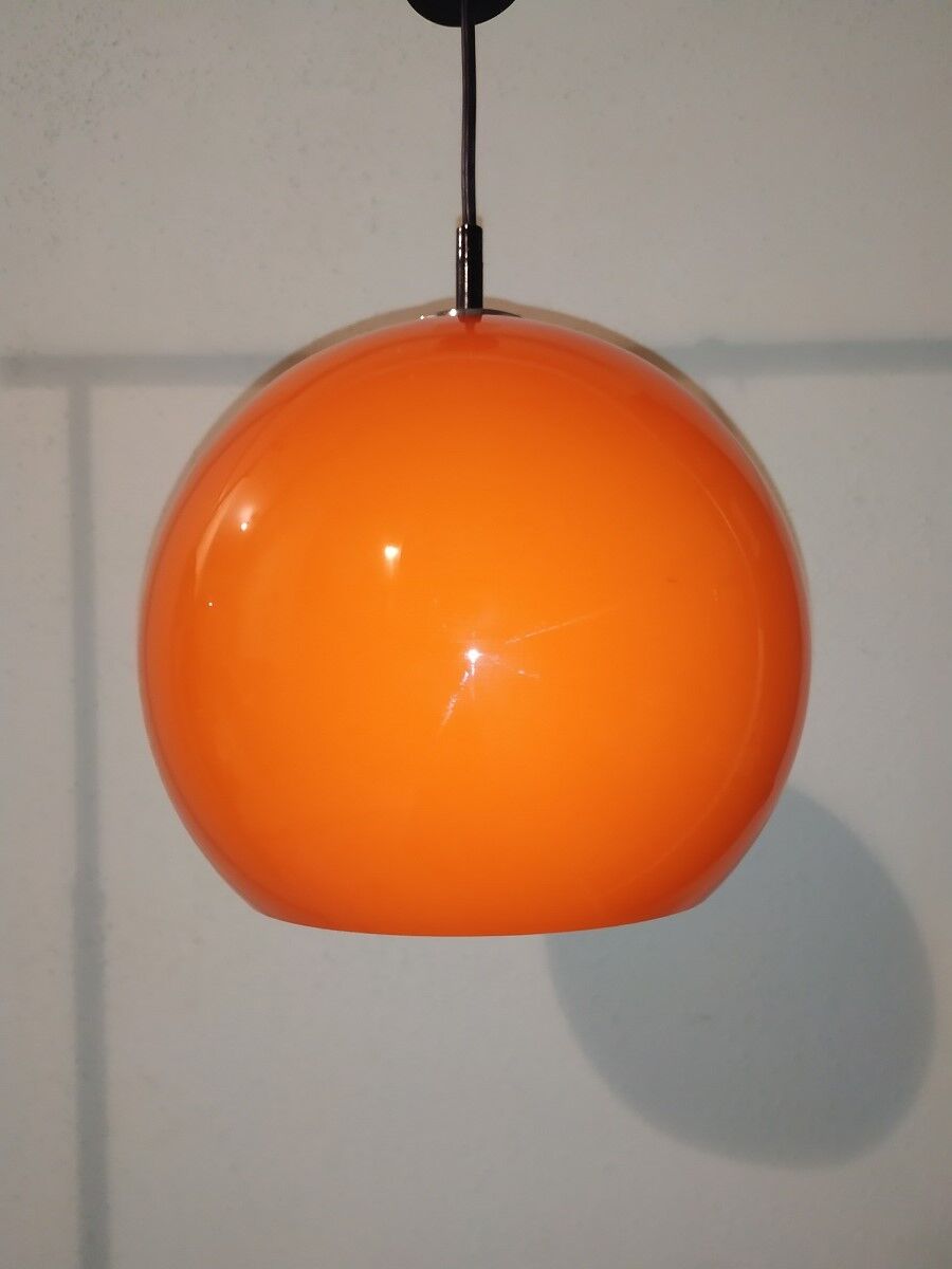 Suspension lamp in orange glass