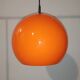 Suspension lamp in orange glass