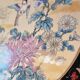 Vintage Japanese decorative plate with chrysanthemum and bird patterns.