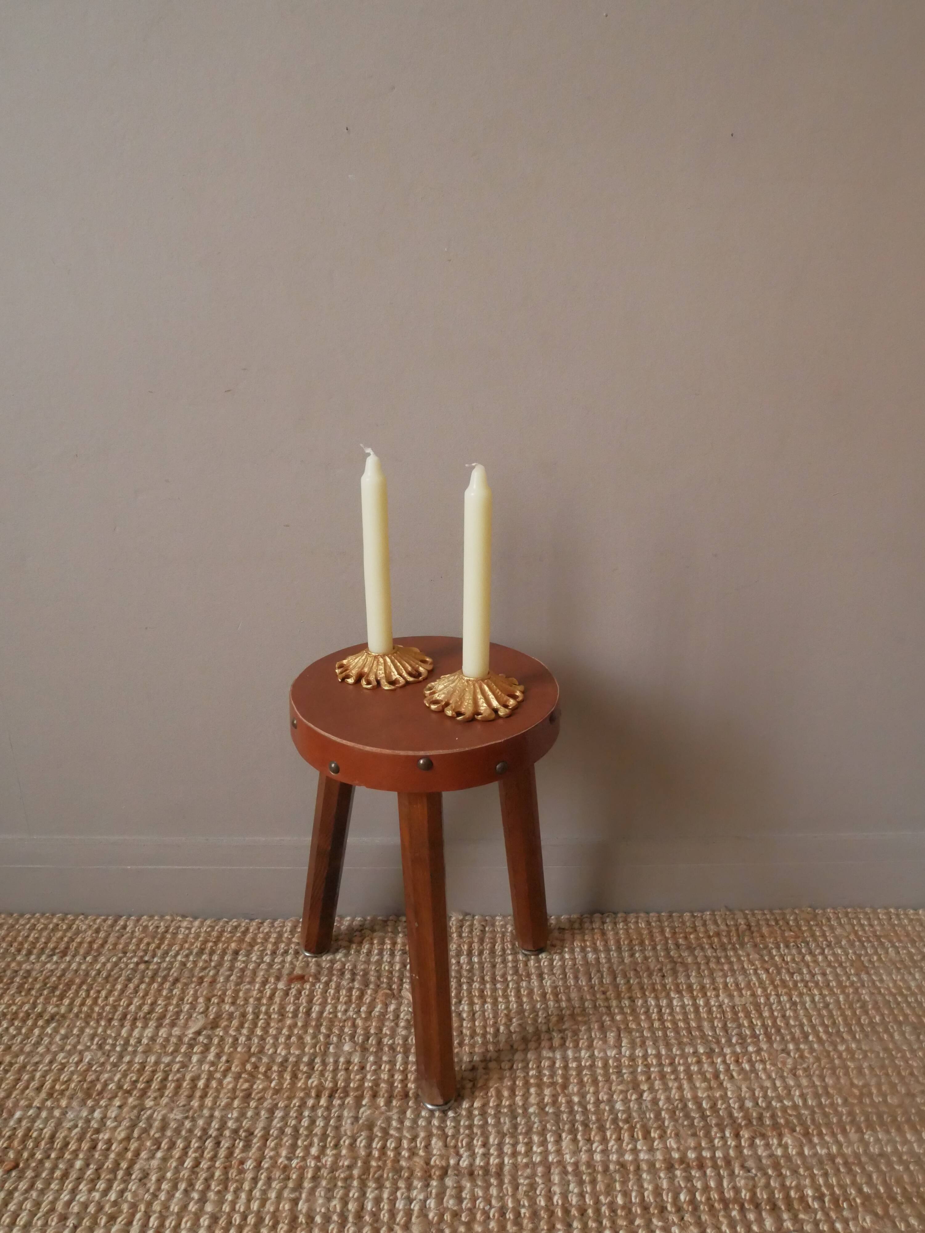 Pair of gold metal candle holders