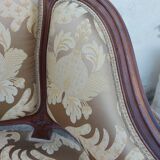 Louis XV shepherdess armchair in carved walnut