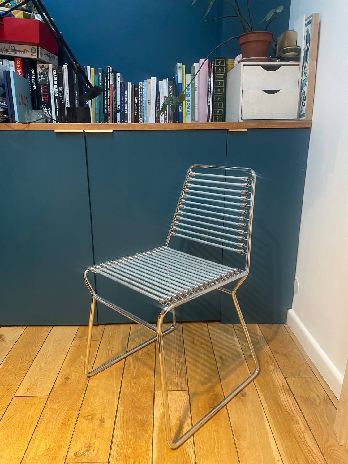 2 metal chairs with bungee cords