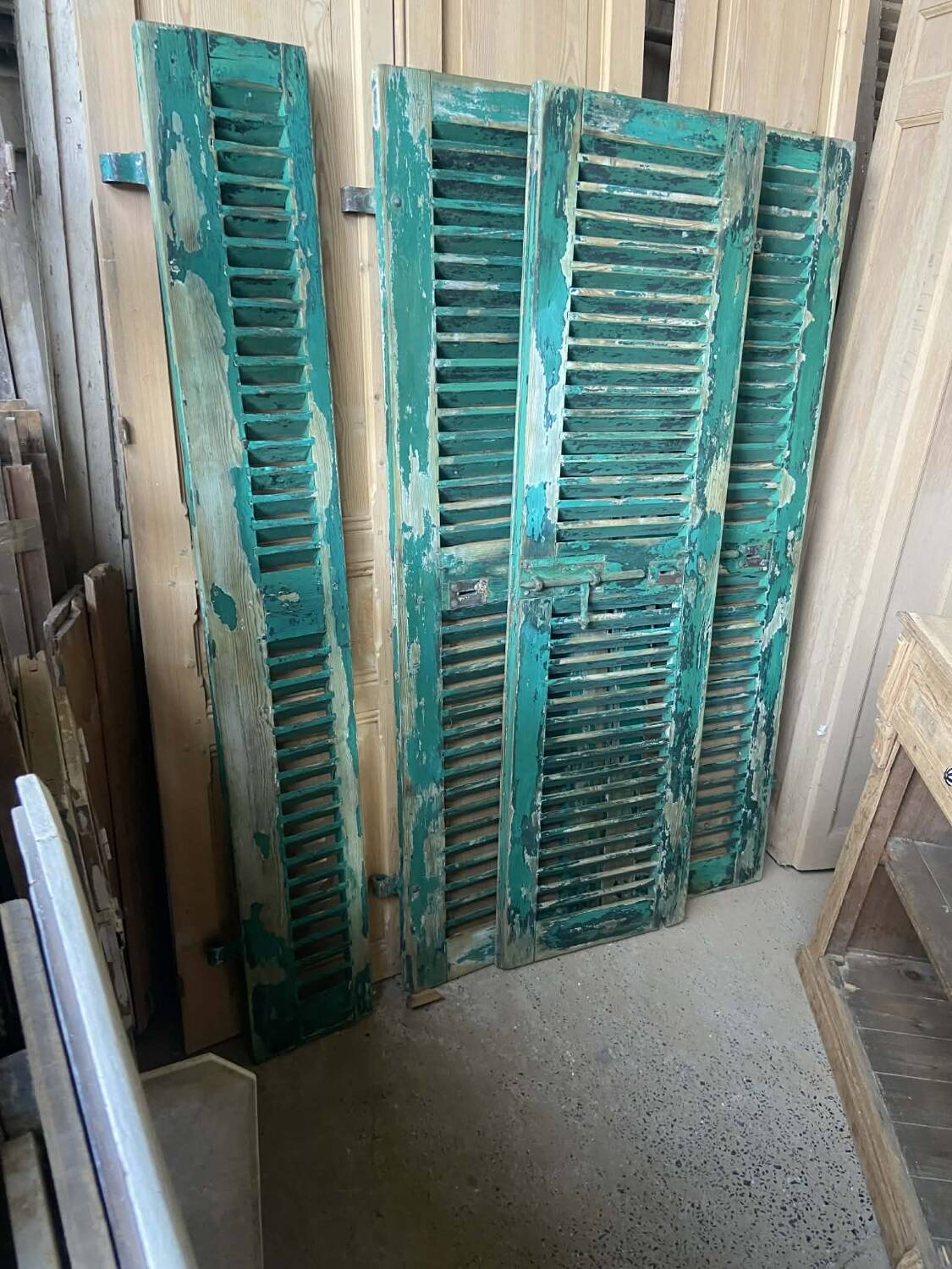 Old green shutter blinds