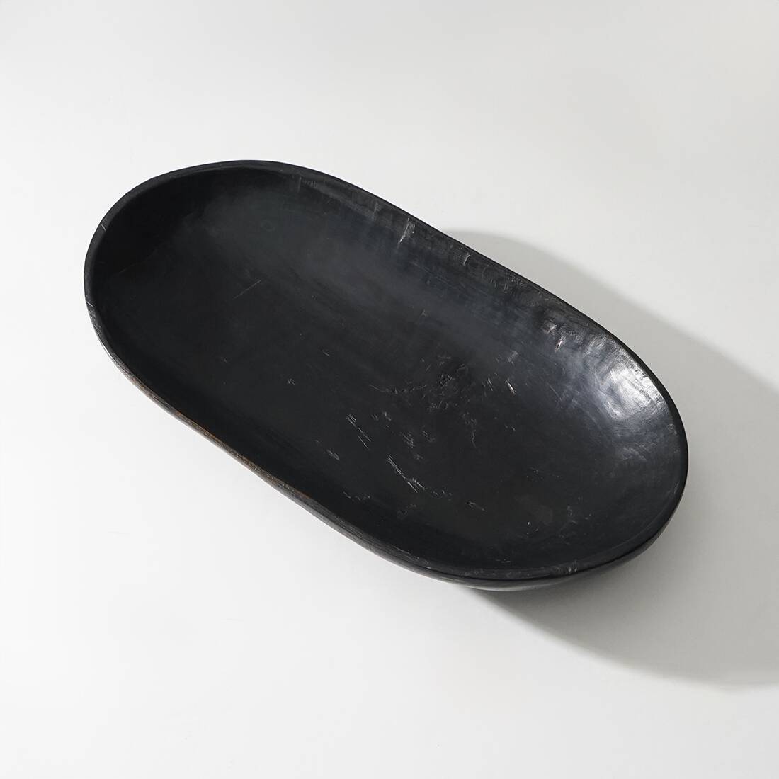Organic shaped black wooden bowl, 1960s