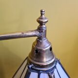Old brass desk lamp with stained glass. 20th century.
