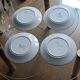 set of 4 Art Deco plates signed Louis Garin HB Quimper