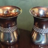 Curved bronze vases