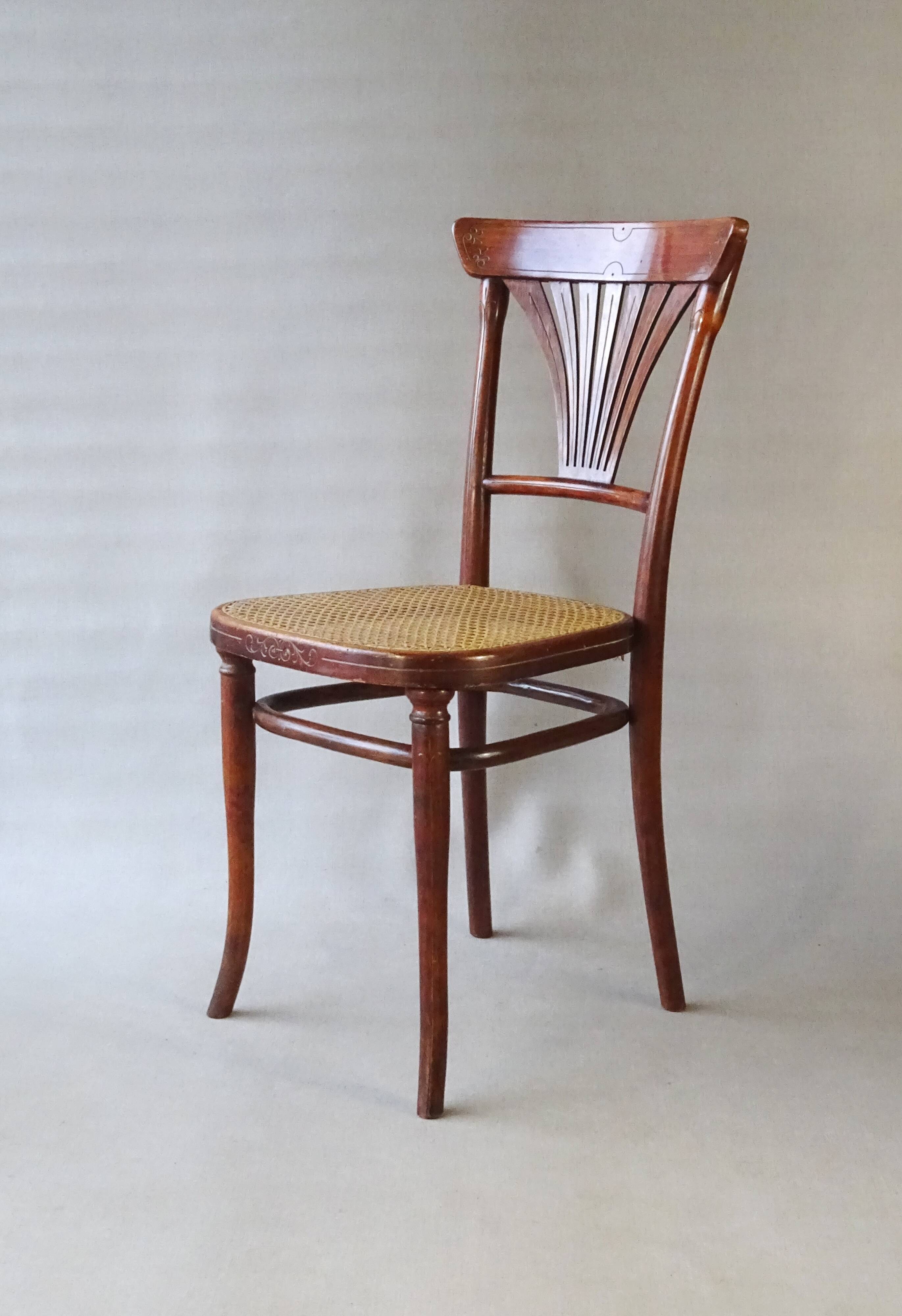 2 Thonet N°221 chairs, caned Art Nouveau bronze decor