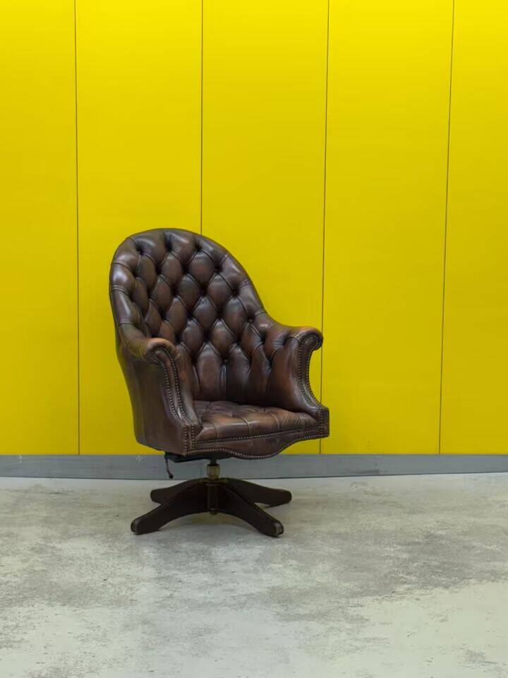 Brown leather chesterfield directors armchair