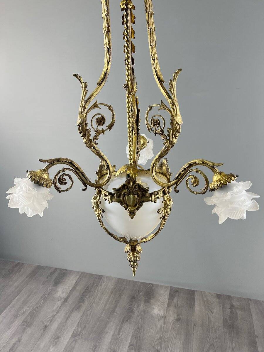 Louis XV style chandelier in bronze and glass, 19th century