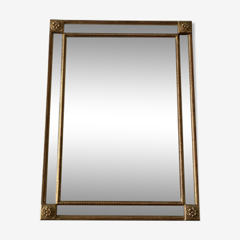 Bevelled mirror in gilded wood 80x110cm