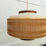 Plastic suspension and rattan