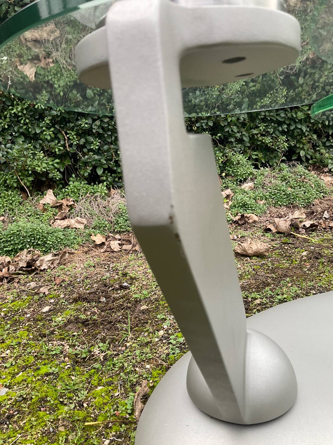 Naos designer coffee table in tempered glass and cast iron