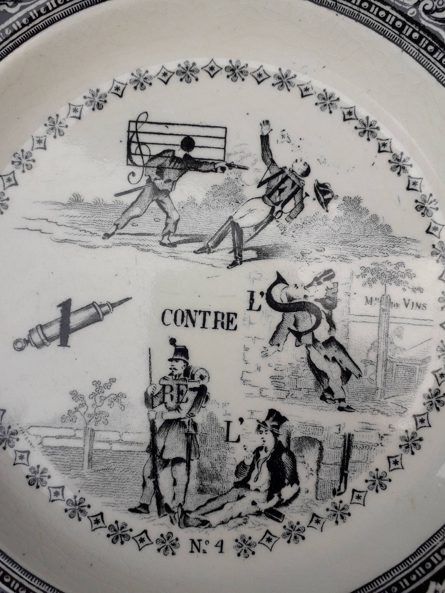 Old plate in Gien opaque porcelain