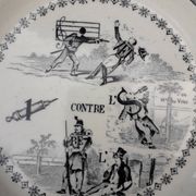 Old plate in Gien opaque porcelain