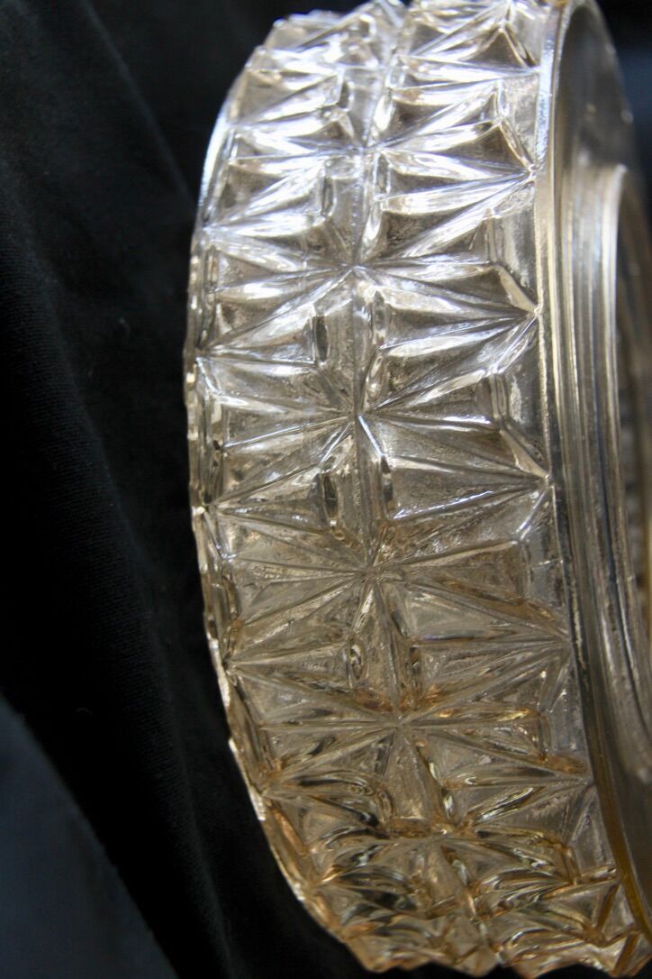 Round ceiling light made of transparent amber glass