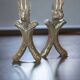 Zoomorphic buff brass and cast iron andirons