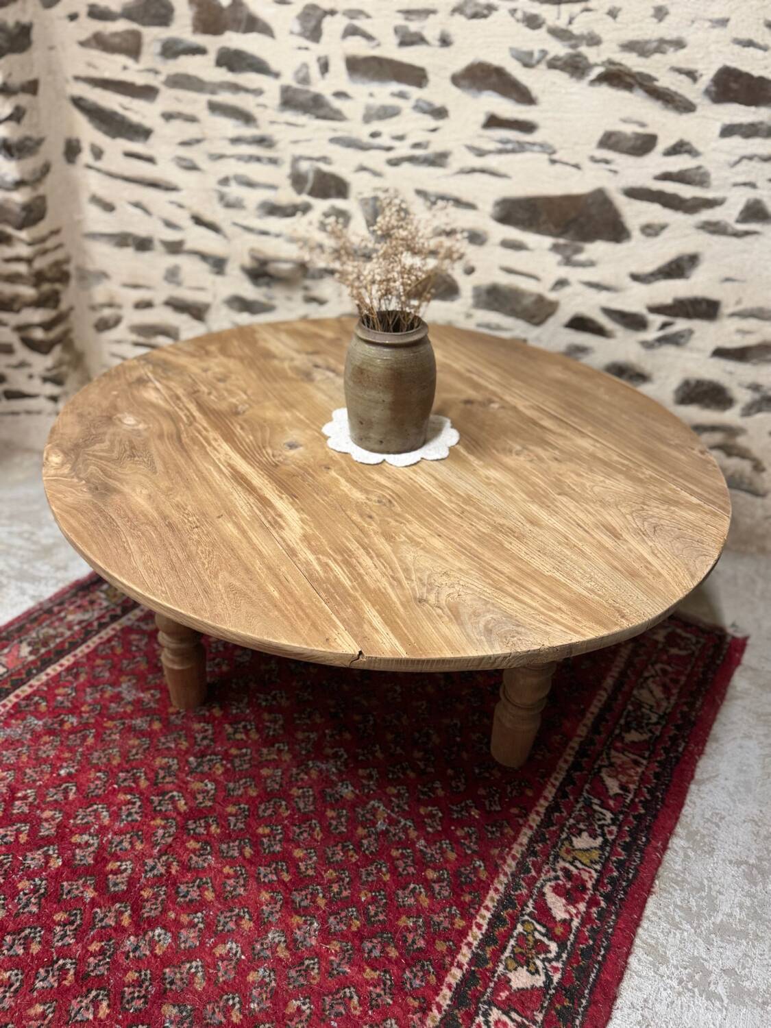 Oval coffee table in raw wood