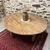 Oval coffee table in raw wood