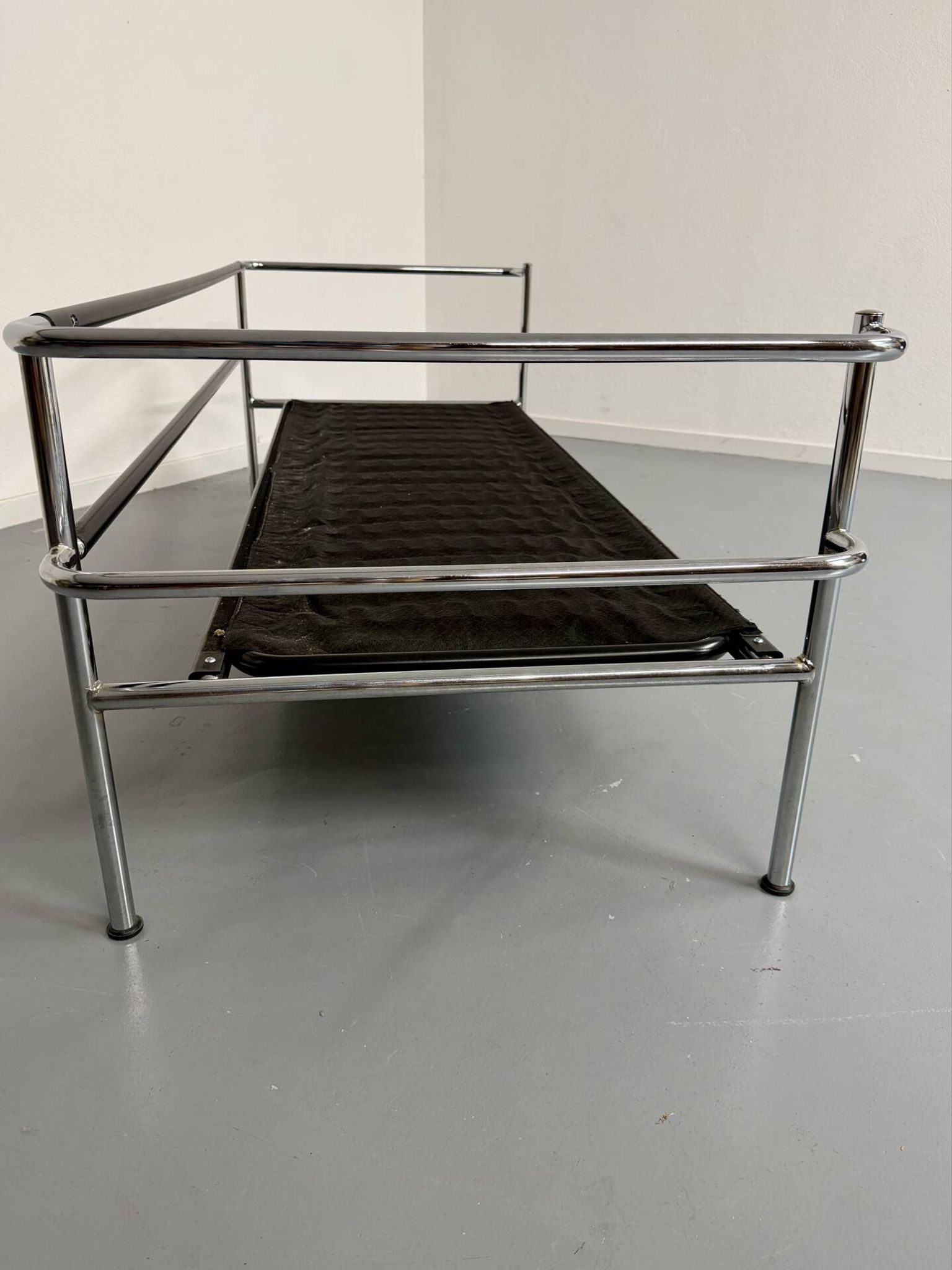 Three-seater tubular chrome and black leather sofa by Kébé, Denmark 80